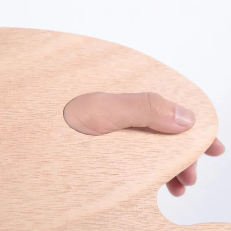 Paleta oval de madeira para mistura de tintas com design ergonômico.
Misturador de cores leve e resistente, ideal para pintura a óleo e acrílica.