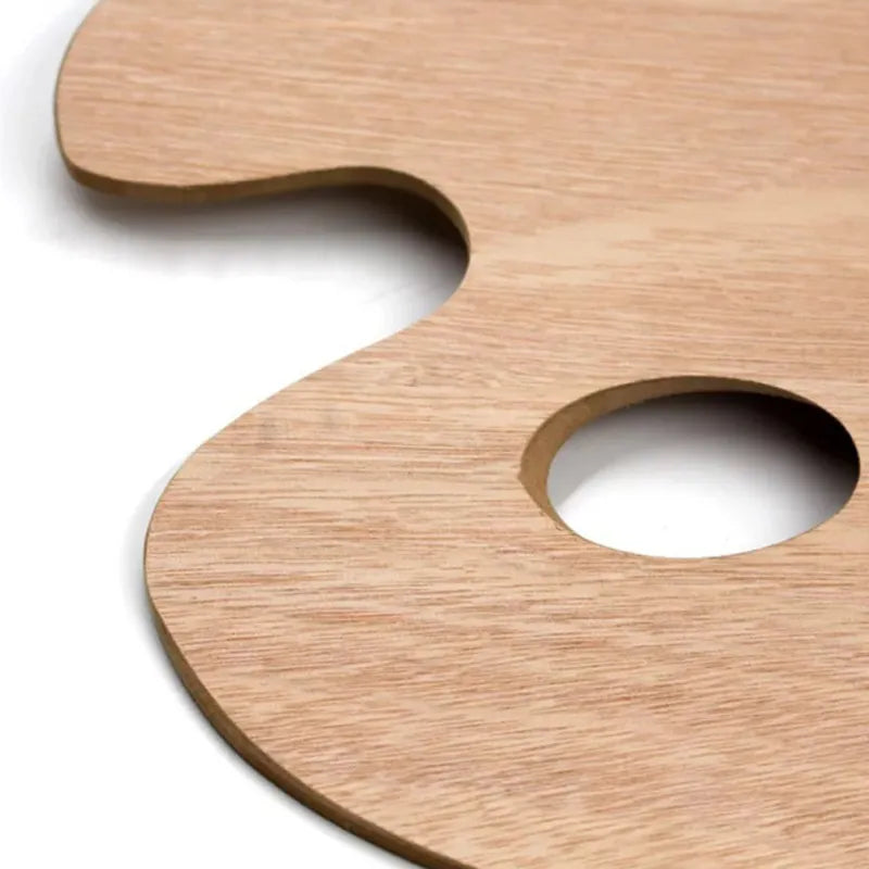 Paleta oval de madeira para mistura de tintas com design ergonômico.
Misturador de cores leve e resistente, ideal para pintura a óleo e acrílica.