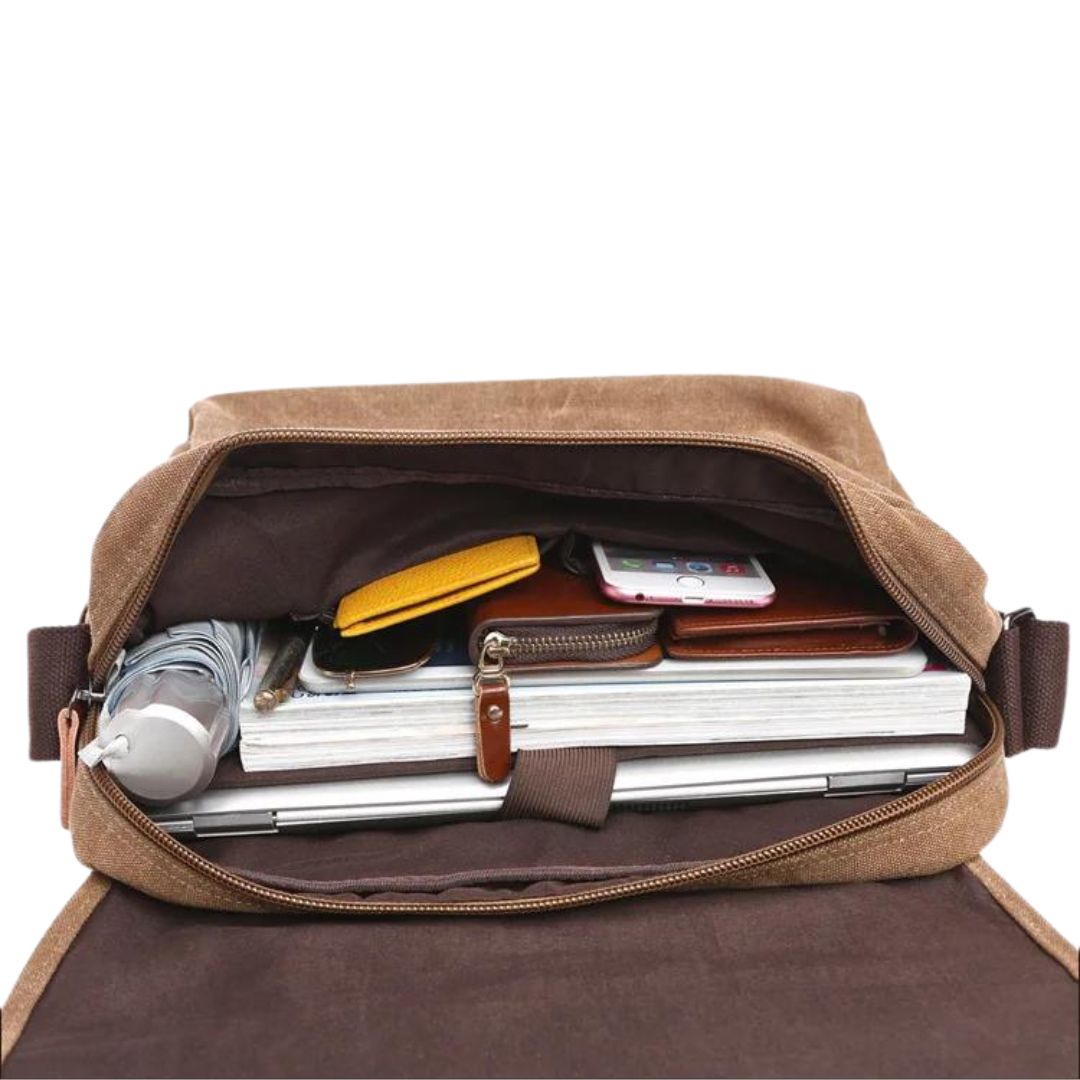 Bolsa Casual Masculina possui especificações que incluem bolso interno com zíper feito com forro de poliéster e material principal Oxford. Disponível nos tamanhos pequeno, médio e grande, a bolsa pode guardar sua carteira, iPad, celular, chaves e muito mais. Use-a confortavelmente como ombro ou bolsa e carregue seus itens essenciais com facilidade.