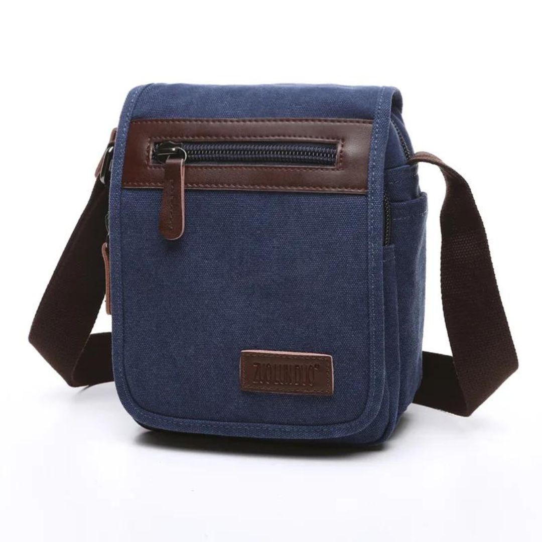 Bolsa Casual Masculina possui especificações que incluem bolso interno com zíper feito com forro de poliéster e material principal Oxford. Disponível nos tamanhos pequeno, médio e grande, a bolsa pode guardar sua carteira, iPad, celular, chaves e muito mais. Use-a confortavelmente como ombro ou bolsa e carregue seus itens essenciais com facilidade.