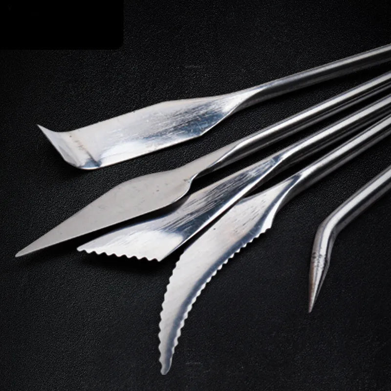 Conjunto de 5 ferramentas de escultura em aço inoxidável para argila e cerâmica.
Ferramentas de modelagem e escultura para artistas e estudantes.